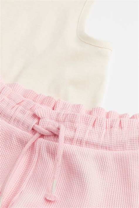 2-piece set with a cotton vest top and shorts - Light pink/Natural ...