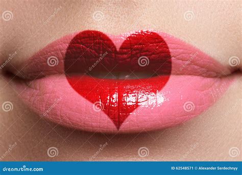 Heart Kiss on the Lips. Beauty Full Lips with Heart Shape Paint ...
