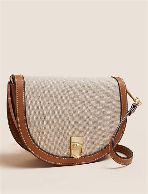 Buy Canvas Saddle Cross Body Bag at Marks & Spencer