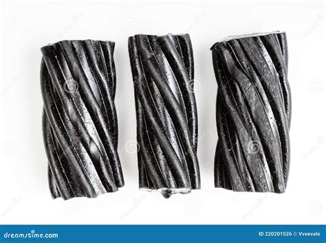 Few Coiled Black Licorice Candies on White Stock Photo - Image of white ...