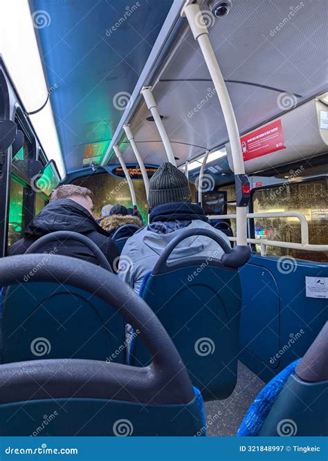 A Crowded Upper Floor Full of Passengers with Handrails, Stop Buttons ...