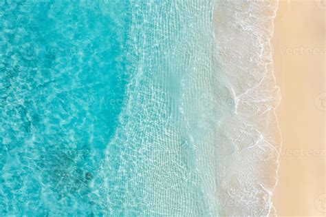 Summer nature landscape. Aerial view of sandy beach and ocean with waves. Beautiful tropical ...