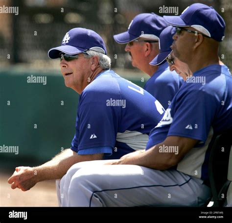 Los Angeles Dodgers manager Grady Little, left, watches the action as ...