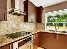 Backsplash With Giallo Ornamental Granite by Giallo Ornamental Granite Countertops Pictures Cost Backsplash With Giallo Ornamental Granite
