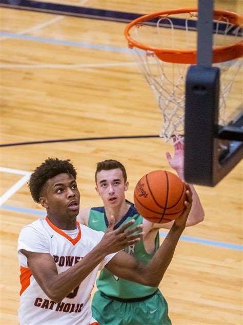 Flint Powers Catholic boys basketball defeats Lapeer 74-55 - mlive.com