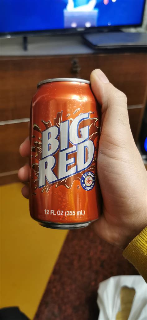 first time trying Big red soda. it's like bubble gum flavored soda, but ...