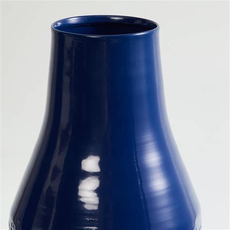 Buy Splendid Metal Narrow Vase from Home Centre at just INR 1999.0