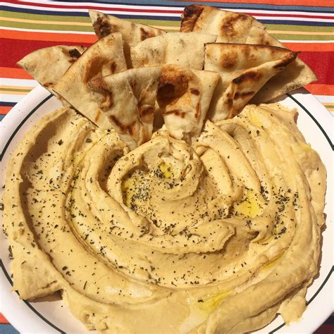 [Homemade] Garlic Lemon Hummus with Naan Bread. Topped with Mint. : r/food