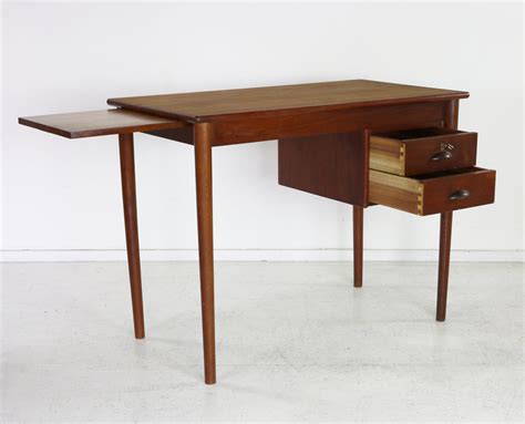 Small danish design teakwood desk with extra leaf