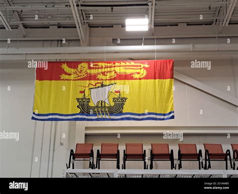 New Brunswick flag at Kent building supplies store sign on Bishop Drive ...