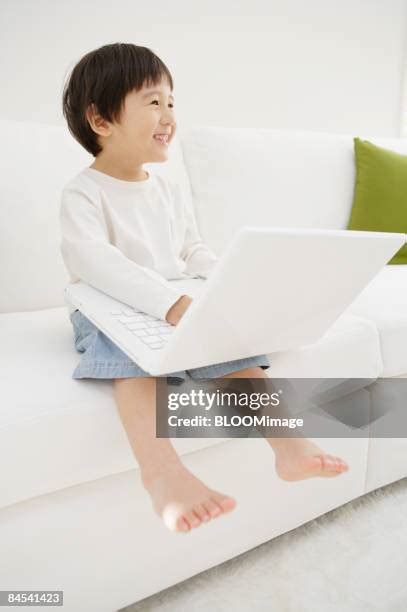 Barefoot Child Using Computer 的图像结果