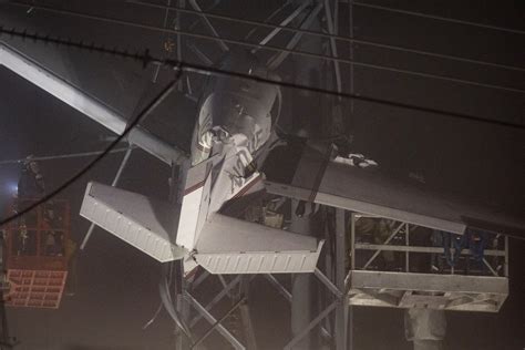 Pilot, passenger rescued from plane that crashed into power lines in ...