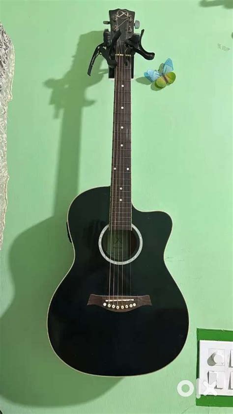 semi acoustic guitar with a leather bag - Musical Instruments - 1824858350