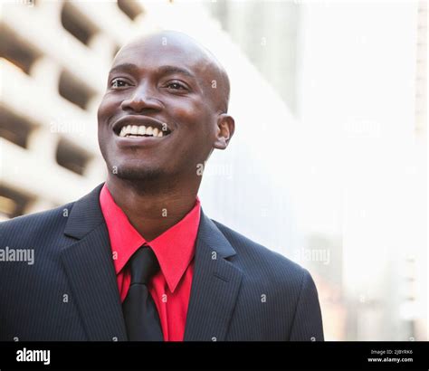 Smiling African American Businessman 的图像结果