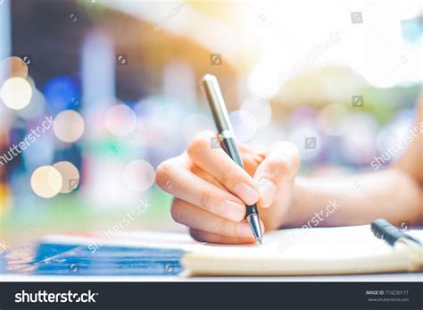 Image result for Writing On Notepad