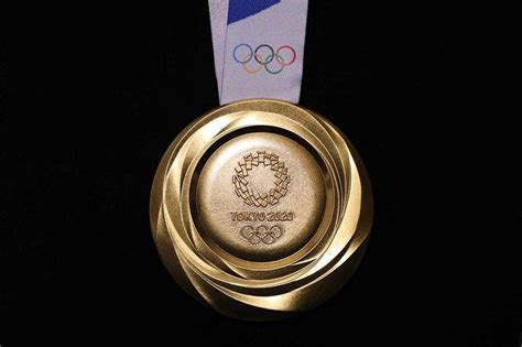 tokyo 2020 unveils olympic medals made from recycled phone metals ...