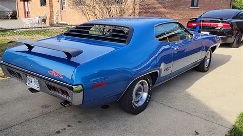 1971 Plymouth GTX Hides Rare 6-BBL Setup Under Air Grabber Hood - autoevolution