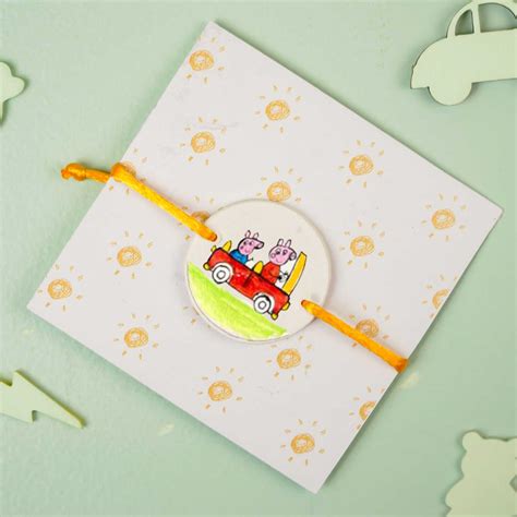 Buy Hand-Painted Peppa Pig Theme Clay Rakhi With Roli Chawal Online On ...