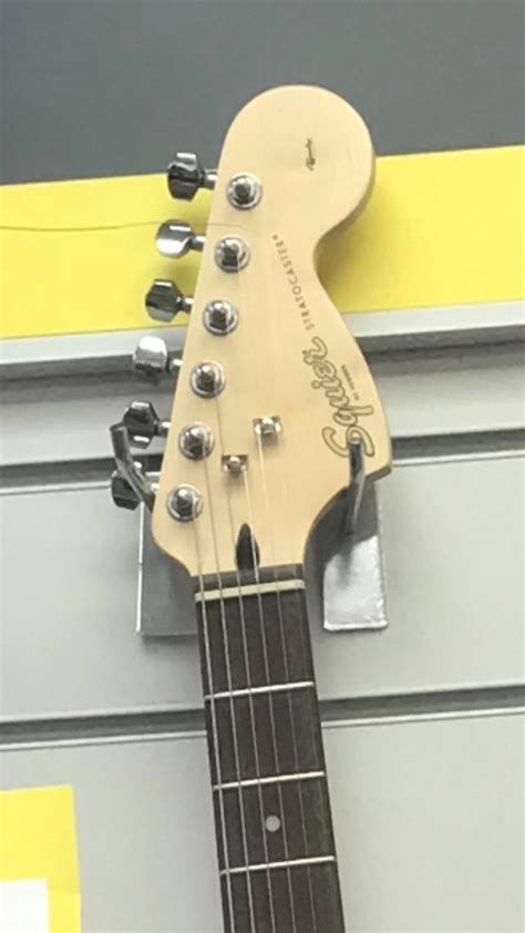 What is the difference between these squire logos? : r/guitars