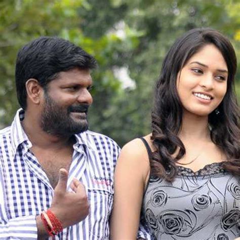 Ganja Karuppu and Sanyathara in a still from the Tamil movie Adhu Vera ...