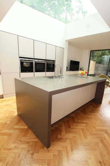 https://st.hzcdn.com/simgs/pictures/kitchens/handleless-kitchen-appliances-lwk-london-kitchens-img~3b5174b407025a6a_4-6777-1-d8d2d8e.jpg?utm_source=chatgpt.com