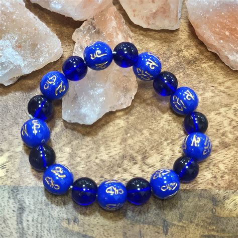Buy Om Mani Padme Hum: Blue Stone Tibetan Band/Bracelet Online in India ...
