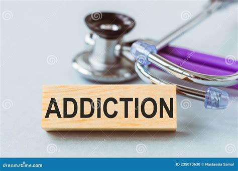 Stethoscope with ADDICTION Words on Wooden Cube Stock Photo - Image of ...