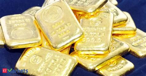 Gold slips on weak global trend - The Economic Times