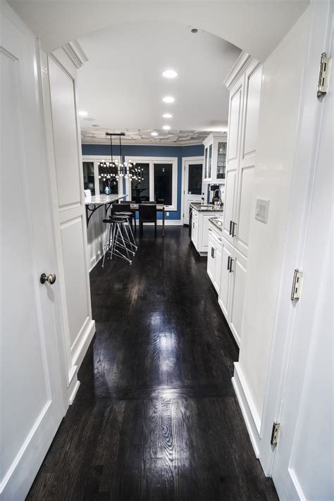 #gabordesignbuild - Dark Walnut Wood Floor for Main Floor Hall