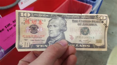 Counterfeit $10 bill with foreign print on it : mildlyinteresting