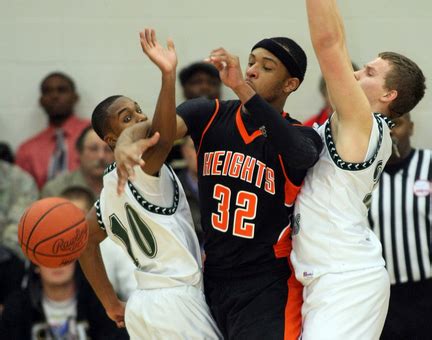 Basketball roundup: Muskegon Heights wins marquee boys matchup with ...