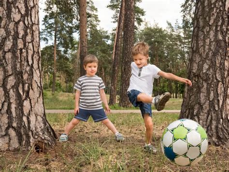Kids Playing Soccer 的图像结果