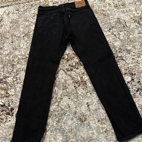 Black Levi jeans - Depop