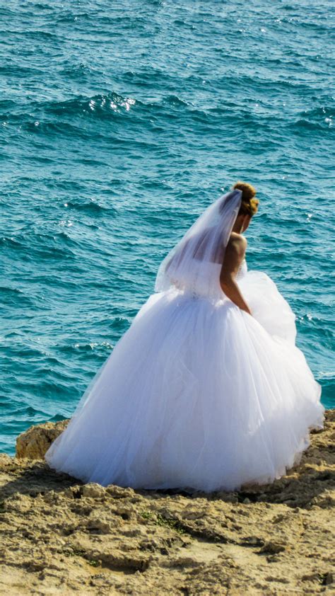 Free Images : sea, outdoor, ocean, wing, white, wave, blue, wedding dress, bride, marine mammal ...