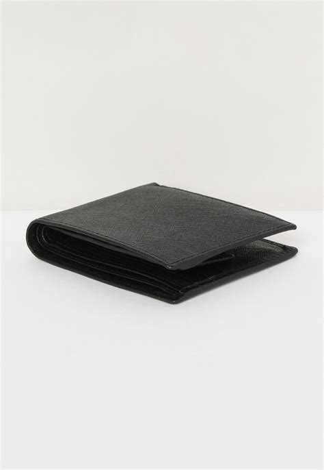 Buy Men Textured Bi-Fold Wallet Online at just Rs. 699.0 ...