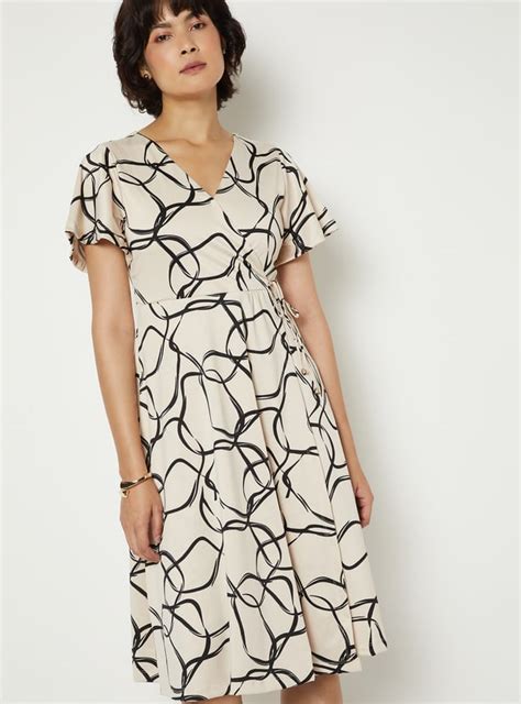 Buy Women Printed Wrap Dress Online at just Rs. 1399.0 - 1000016009677 ...