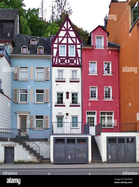 Three colorful 1700 era row homes in Medieval Village of Cochem on the ...
