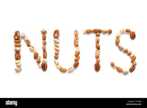 Nuts Spelling The Word Nuts isolated on white. Various nuts (almonds ...