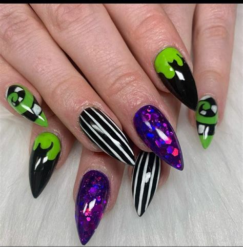 Beetlejuice nails | Nails, Sunflower nails, Halloween acrylic nails