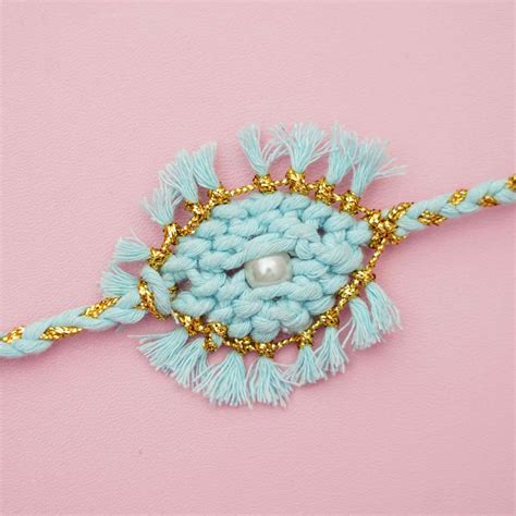 Buy Handmade Macrame Pearl Evil Eye Design Cotton Kids Rakhi With ...