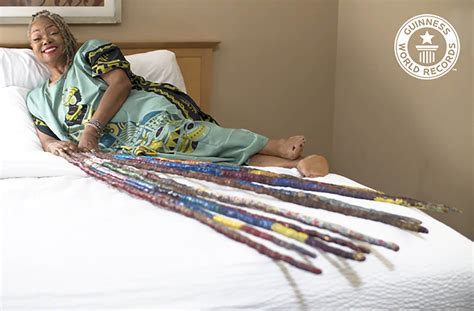 Woman with 42-feet-long fingernails scores world record