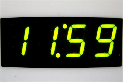 Digital Clock Display 11:59 Digital Clock PowerPoint Template And