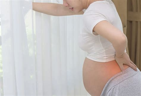 Tailbone (Coccyx) Pain While Pregnant: Causes, Symptoms & Treatments
