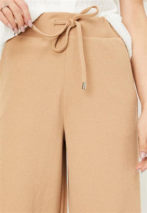 Buy Women Textured Regular Fit Culottes Online at just Rs. 999.0 ...