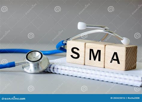 White Notebook, Medical Stethoscope and Wooden Blocks with the Medical ...