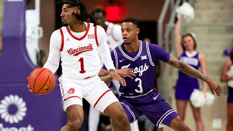 UC's Wes Miller, John Newman III, TCU's Emanuel Miller, Jamie Dixon