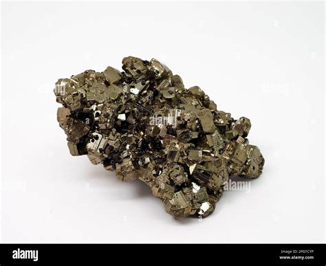 cluster of pyrite cubes with white background - also known as iron ...