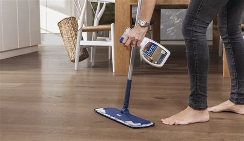 Mopping A Wooden Floor