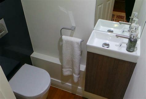 https://st.hzcdn.com/simgs/pictures/powder-rooms/cloakroom-installation-lime-showrooms-ltd-img~b411543005b60e03_9-5822-1-2f2c457.jpg?utm_source=chatgpt.com