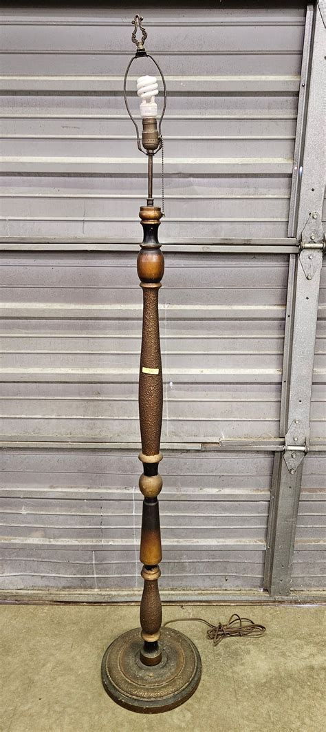 At Auction: ANTIQUE WOODEN FLOOR LAMP